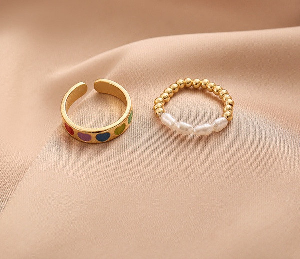 Kahe pärlitega naiste sõrmuse komplekt tavaline mudel