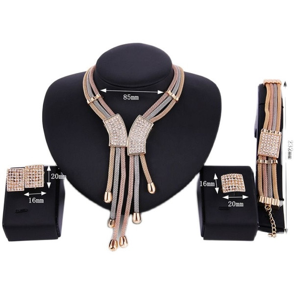 Moodne komplekt kaelakeesõrmuskäevõru ja dekoratiivkividega kõrvarõngaid