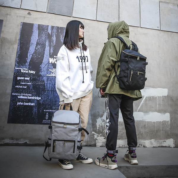 Sport-alkalmi hátizsák utazásra alkalmas zsebekkel