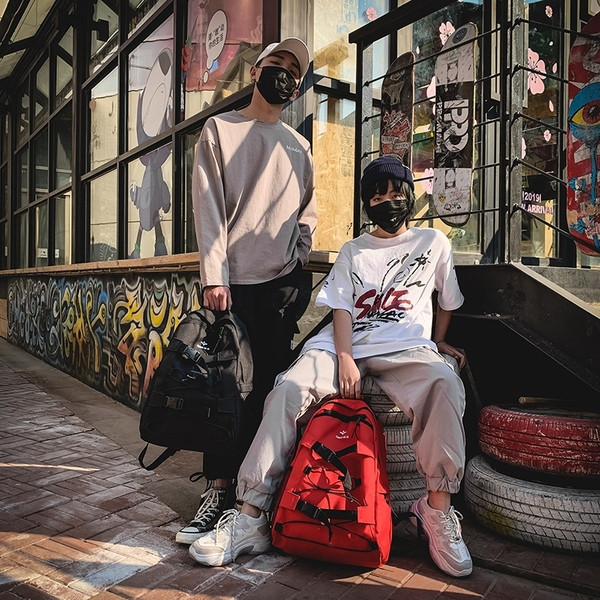 Meestele ja naistele sobiv tekstiilist spordiseljakott