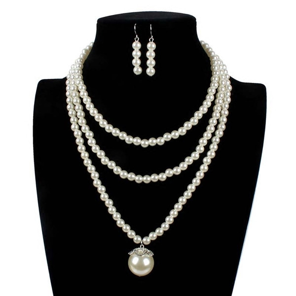 Μοντέρνο σετ κολιέ και σκουλαρίκια με διακοσμητικές πέρλες