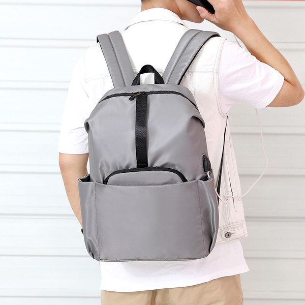 Uus mudel meeste seljakott rihmade ja taskuga