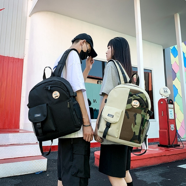 Modern textil hátizsák zsebekkel - férfiaknak és nőknek egyaránt