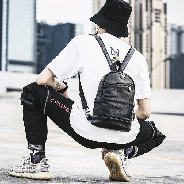 Meeste mustast nahast lukuga seljakott