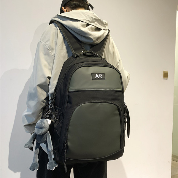 Új modell férfi hátizsák négy színben elülső zsebbel és cipzárral