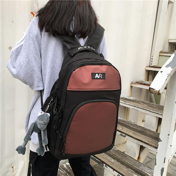 Új modell férfi hátizsák négy színben elülső zsebbel és cipzárral