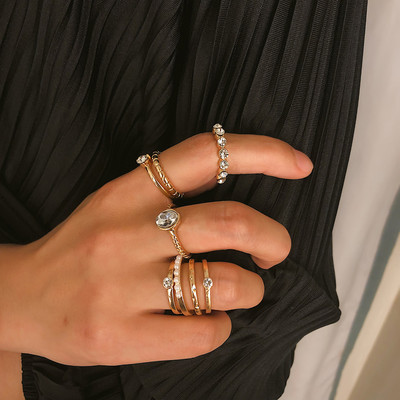 Актуален дамски комплект от седем  пръстена с камъни