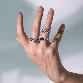 Модерен дамски комплект от четири пръстена изчистен модел