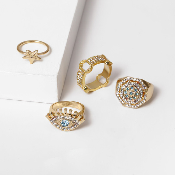 Κομψό γυναικείο σετ τεσσάρων δαχτυλιδιών με διακοσμητικές πέτρες