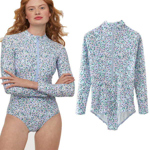 Női test hosszú ujjú virágos motívumokkal