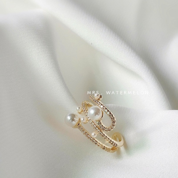 Κομψό γυναικείο δαχτυλίδι μοντέλο με διακοσμητικές πέτρες  και μαργαριτάρια