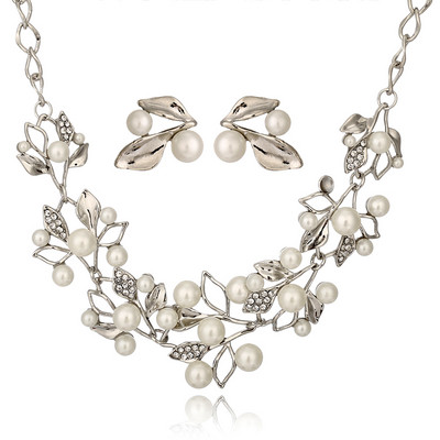 Μοντέρνο γυναικείο σετ κολιέ και σκουλαρίκια με  διακοσμητικές πέτρες και πέρλες