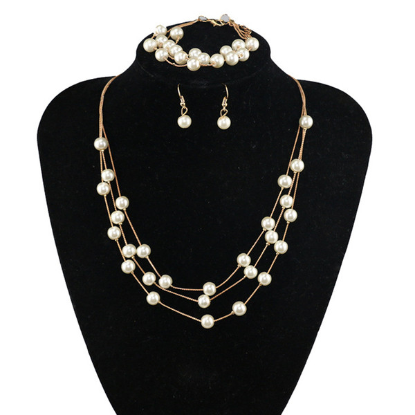 Модерен комплект от колие, гривна и обеци с декоративни перли