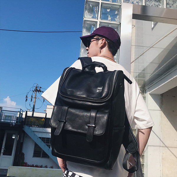 Нов модел кожена раница с джобове и дръжка 