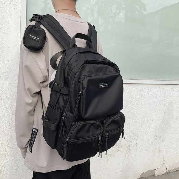 Ежедневна мъжка раница с предни джобове в черен цвят