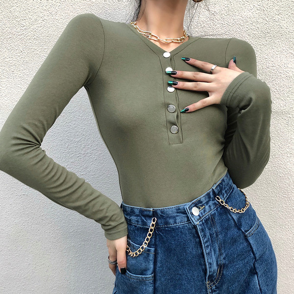 Corp de damă cu nasturi și decolteu adânc în verde