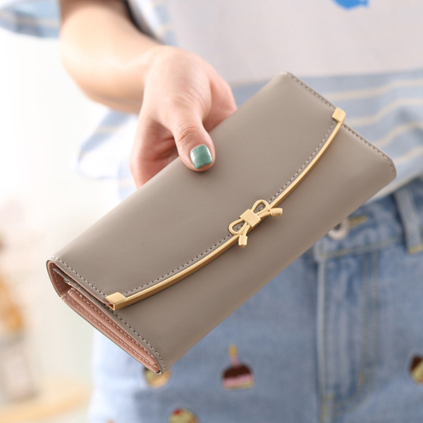 Portofel de dama cu panglica si decor metalic