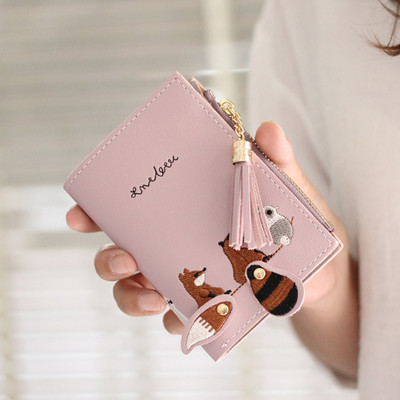 Γυναικείο πορτοφόλι με τρισδιάστατο στοιχείο και φούντα - δύο μοντέλα