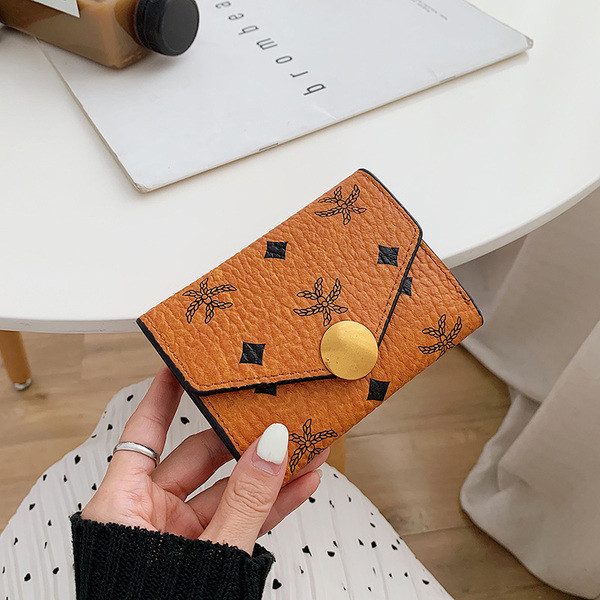 Kolmes värvitoonis metallist kinnitusega ökonahast naiste rahakott