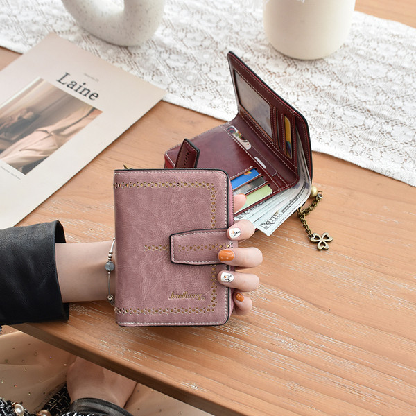 Naiste rahakott ökonahast metallelemendiga