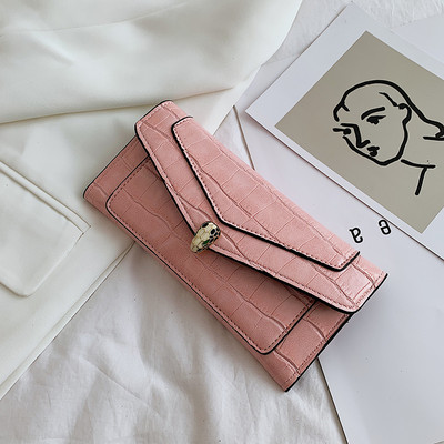 Γυναικείο δερμάτινο πορτοφόλι με μεταλλικό κούμπωμα σε διάφορα χρώματα