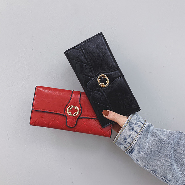 Naiste rahakott ökonahast metallist kaunistusega mitmes värvitoonis