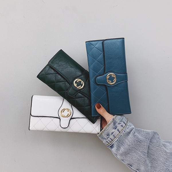 Naiste rahakott ökonahast metallist kaunistusega mitmes värvitoonis