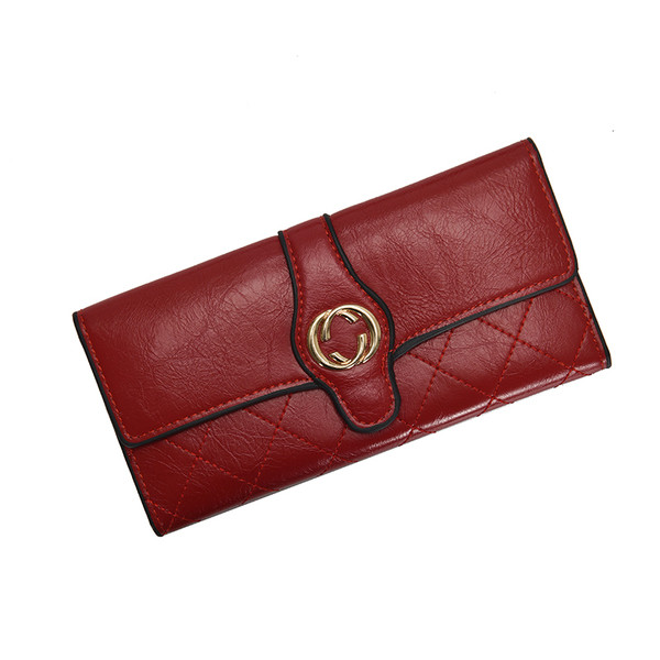 Naiste rahakott ökonahast metallist kaunistusega mitmes värvitoonis