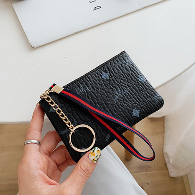 Γυναικείο έκο δερμάτινο πορτοφόλι με μενταγιόν