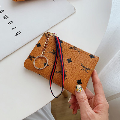 Γυναικείο έκο δερμάτινο πορτοφόλι με μενταγιόν