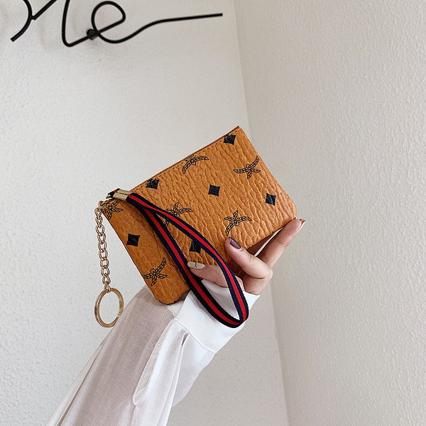 Γυναικείο έκο δερμάτινο πορτοφόλι με μενταγιόν