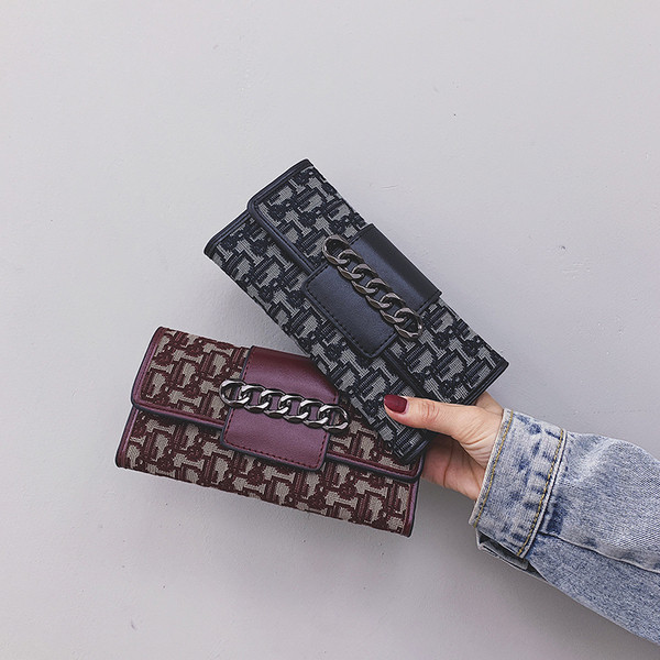 Naiste moodne neljas värvitoonis metallist kaunistusega rahakott