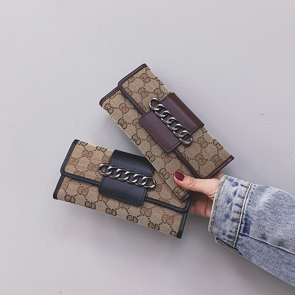 Naiste moodne neljas värvitoonis metallist kaunistusega rahakott