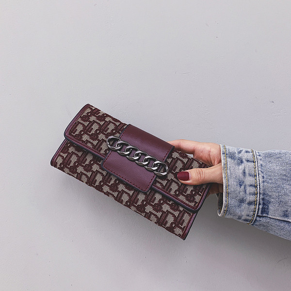 Naiste moodne neljas värvitoonis metallist kaunistusega rahakott