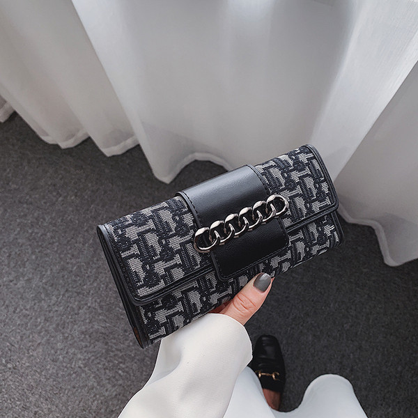 Naiste moodne neljas värvitoonis metallist kaunistusega rahakott