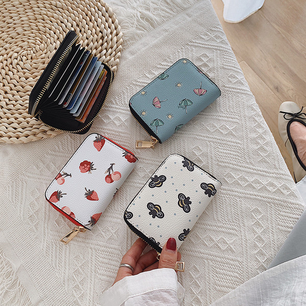 Moodne lukuga ja värvilise mustriga naiste rahakott