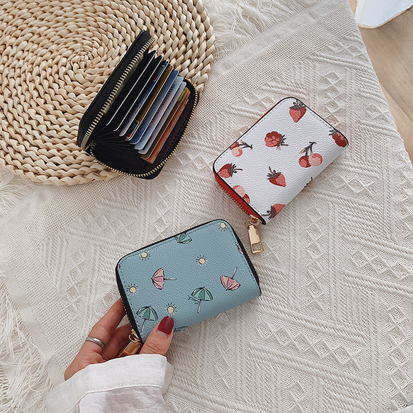 Moodne lukuga ja värvilise mustriga naiste rahakott