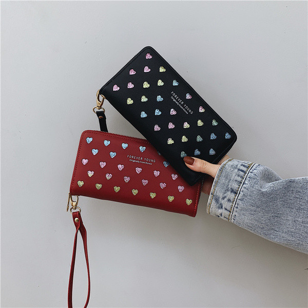 Moodne naiste rahakott südamete ja kirjaga