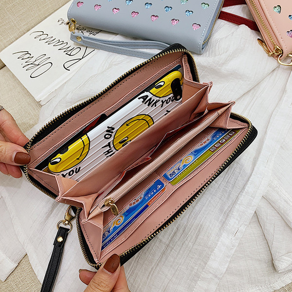 Moodne naiste rahakott südamete ja kirjaga