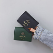 Portofel de dama din piele cu element metalic si broderie