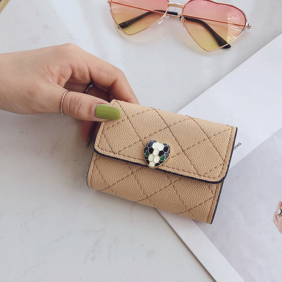 Portofel de dama cu decor si inchidere metalica