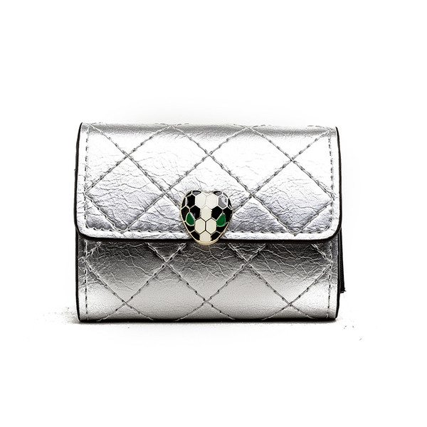 Portofel de dama cu decor si inchidere metalica