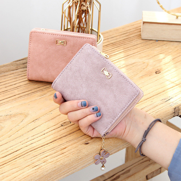 Νέο μοντέλο γυναικείο έκο δερμάτινο πορτοφόλι με μεταλλικό λουλούδι