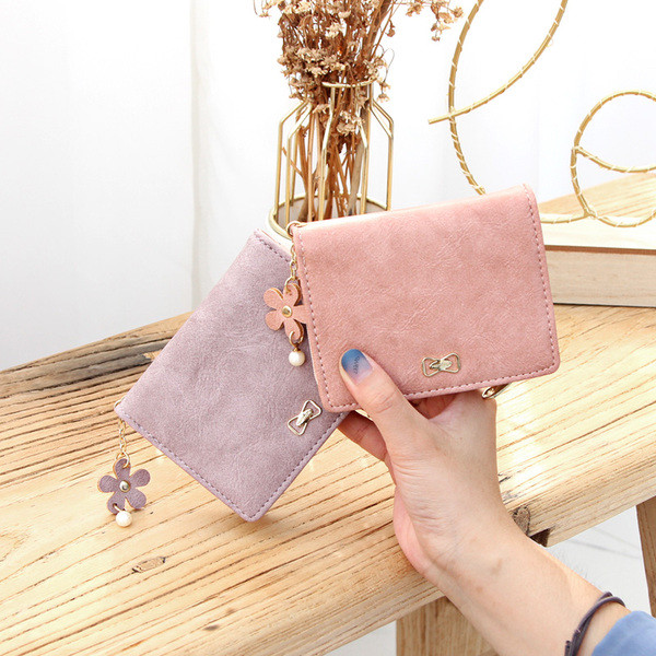 Νέο μοντέλο γυναικείο έκο δερμάτινο πορτοφόλι με μεταλλικό λουλούδι