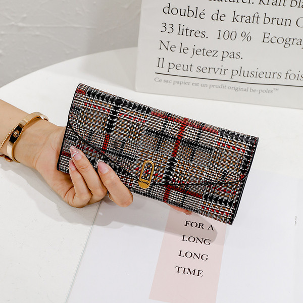 Portofel de dama cu decor metalic in gri si maro