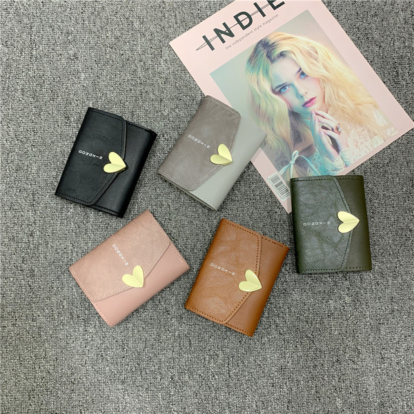 Naiste kaasaegne metallist südamega rahakott