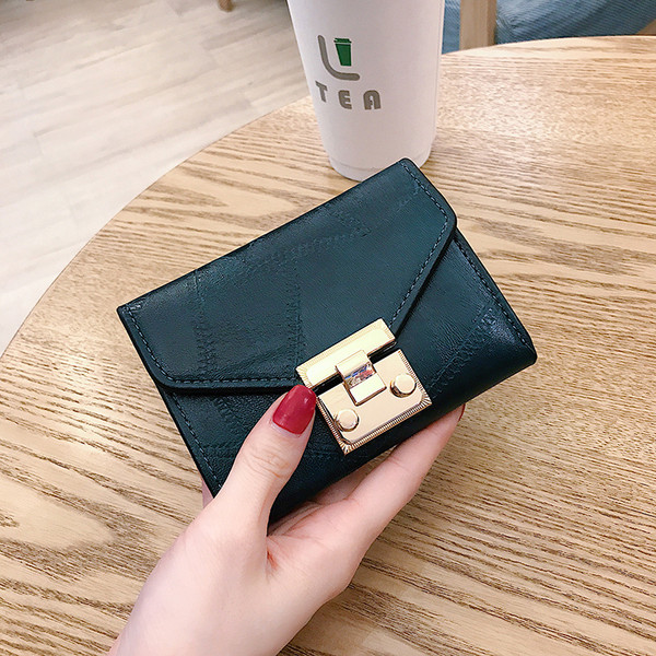 Portofel de dama modern cu catarama metalica