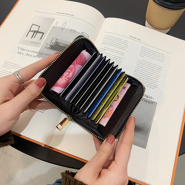 Naiste igapäevane rahakott luku ja metallelemendiga