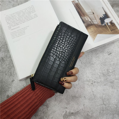 Naiste nahast rahakott kirja ja lukuga