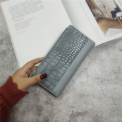 Naiste nahast rahakott kirja ja lukuga